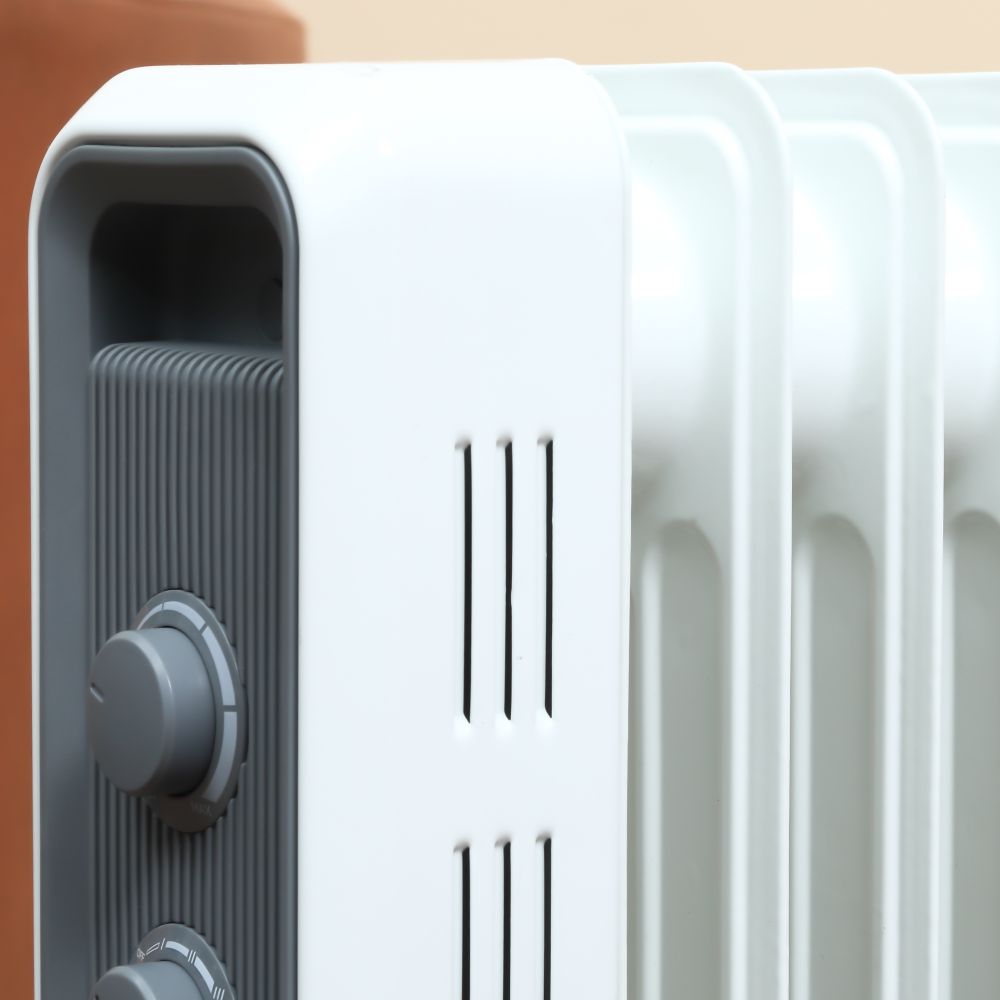 Oil Filled Radiator 7 Fin Portable Heater w, Wheels and 3 Heat Settings, White